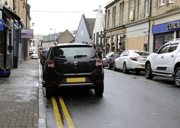 Manor Street allows parking on the left side for drivers  with a blue badge only