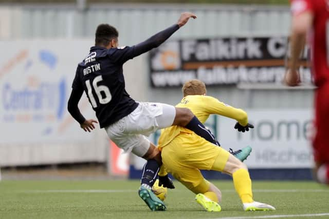 Austin was taken down by Lee Robinson for the penalty. Picture by Michael Gillen