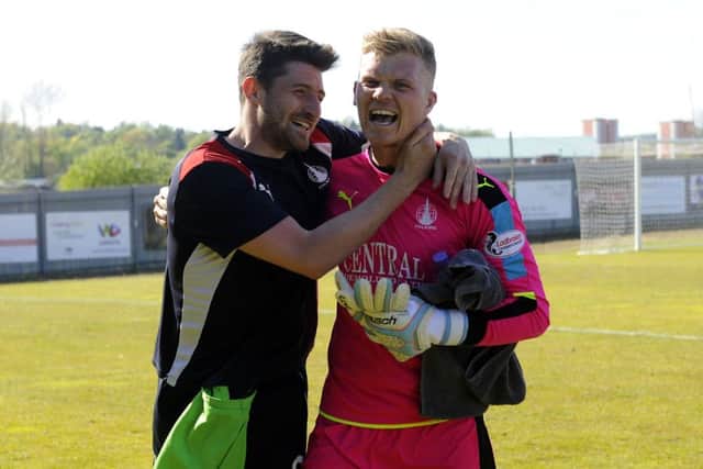 Lewis Kidd 2 and Robbie Thomson 24 celebrate Falkirk earning a play-off bye in the quarter finals. Picture Michael Gillen.