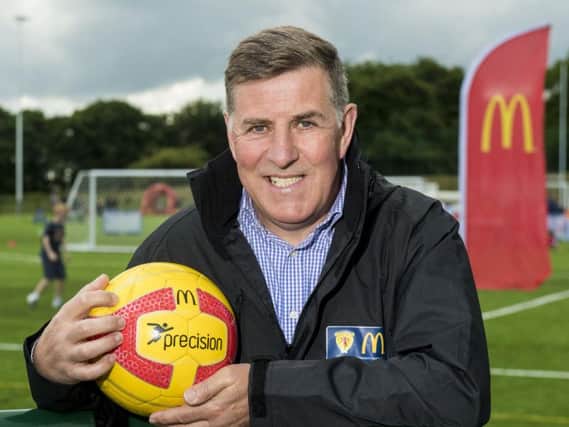Mark McGhee is glad Wayne Rooney is not in the England squad