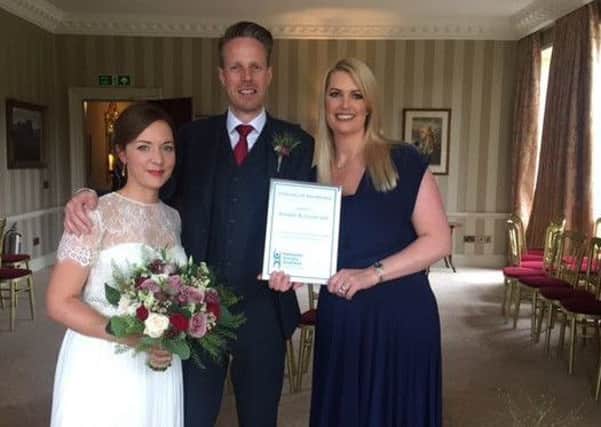 Alasdair and Louise Jack with Melanie Leckie, celebrant of Humanist Society Scotland.