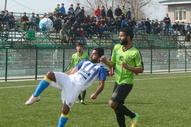 Action from a Real Kashmir match  (pic by Irfan Malik).