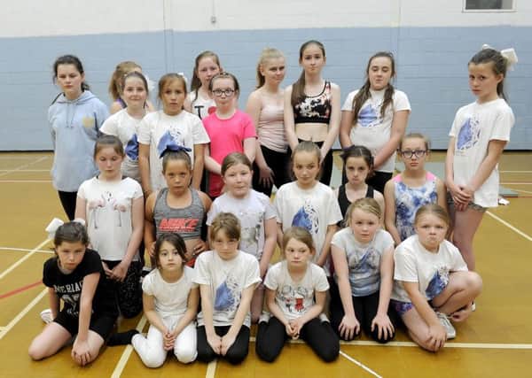 The girls of the Sapphire Dance & Cheer group are devastated following the theft of their money and equipment. Picture: Michael Gillen
