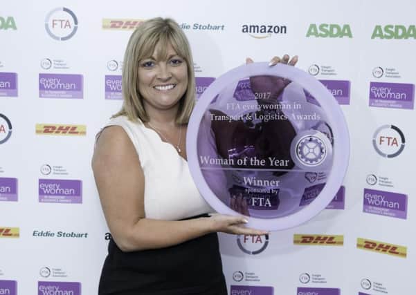 Asda business change manager Julie McCaffery receives her Woman of the Year award