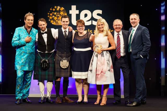The Larbert High School team at the Tes awards ceremony in London with host Julian Clarey