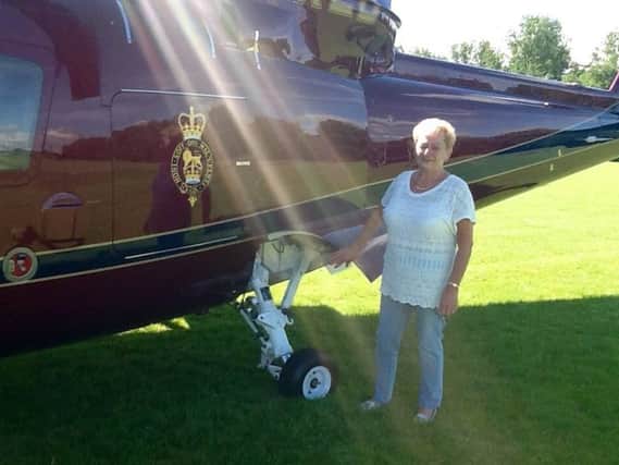 Lynda next to the Queen's helicopter