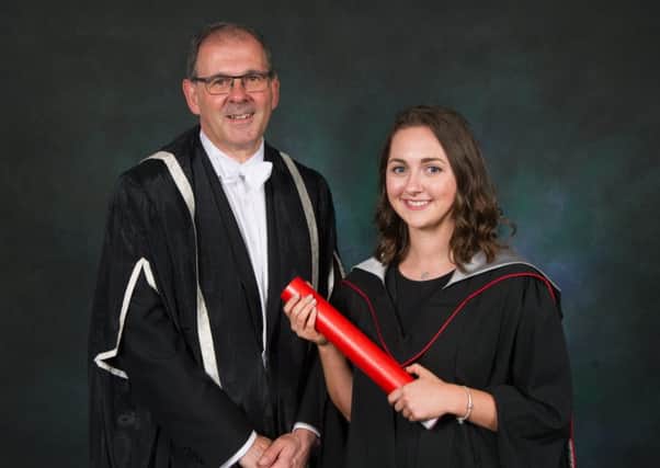 Kirsten McArdle from Linlithgow scoops a top honour at Glasgow Univeristy after graduating first in her BA Accounting and Finance degree alongside Professor Neal Juster, senior vice principal at the University of Glasgow