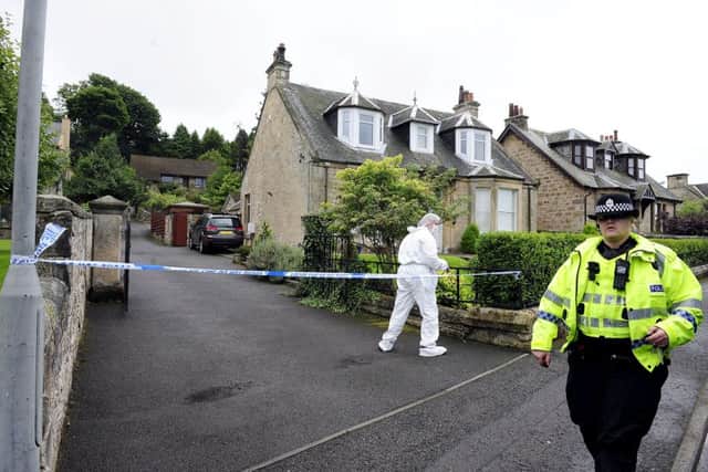 Police continue investigation's at Arnold Mouat's home in  Panbrae Road, Bo'ness where his body was discovered