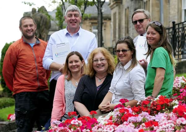 The Falkirk Delivers team with the Keep Scotland Beautiful judges