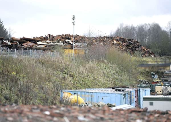 Residents oppose plans to bring more metal to salvage site