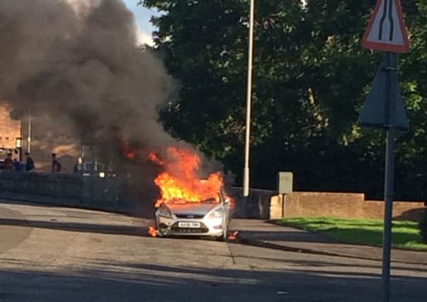 The stolen car was found in flames in Carron. Picture: Paula Somerville