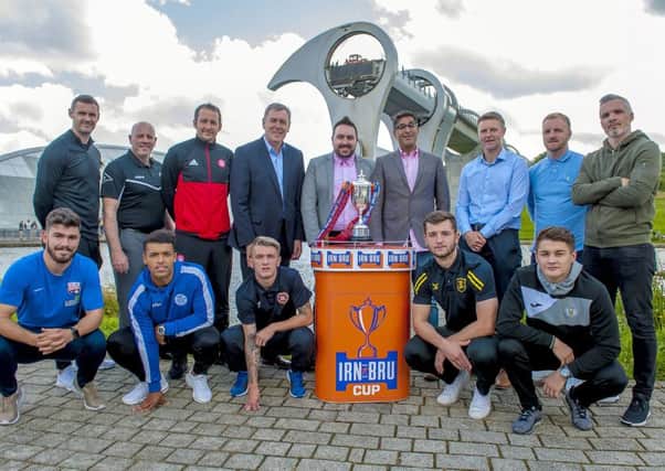 Irb Bru Cup second round draw at the Falkirk Wheel featuring Pat Bonner and Sanjeev Kohli.