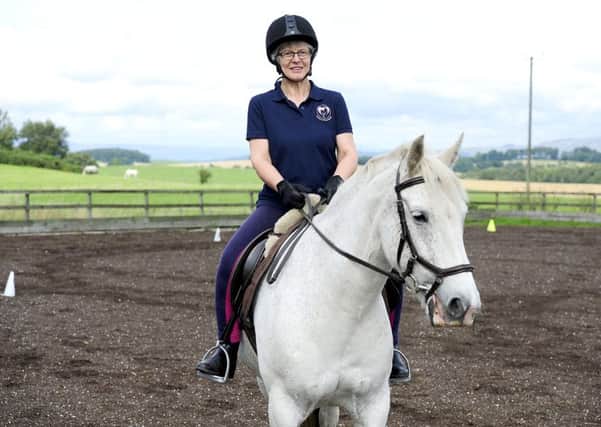 Anne Brown, who has secondary progressive multiple sclerosis, is embarking on a number of daring challenges to raise money and awareness of Equi-Power Central Scotland RDA. Picture: Michael Gillen