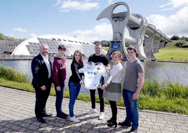 Finn Russell, centre, with members of the fundraising team
