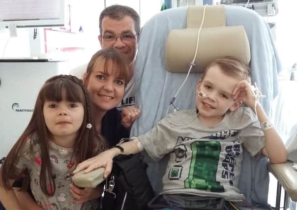 James Robertson and his family, dad Stuart, mum Lisa and sister Kayleigh have relocated to Londons Great Ormond Street Hospital as the youngster recovers