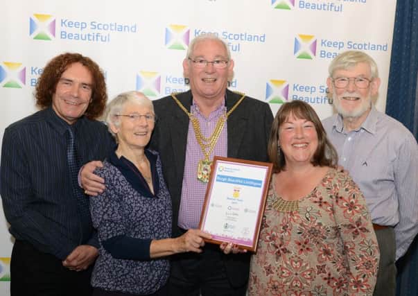 Burgh Beautifuls Ron Smith, Averil Stewart, Heather Lynch and Gavin Stewart presented award by Fife Provost Jim Leishman at Beautiful Scotland