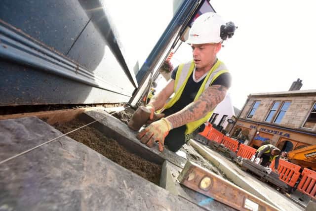 Men at work...workers from MacLay Civil Engineering Ltd are now powering through work in Manor Street. (Pic: Lisa Evans)
