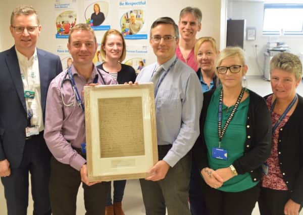 Mr John Camilleri-Brennan and members of his team are pictured receiving the William Cullen Prize from NHS Forth Valley Medical Director Andrew Murray (far left) and Dr Dan Beckett, NHS Forth Valley Consultant Acute PhysicianÂ and RCPE Fellow (second from left).