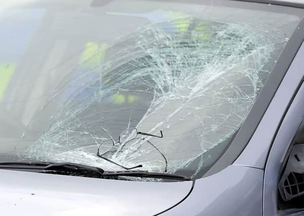 A pair of spectacles lay on the windscreen following the collision. Picture: Michael Gillen