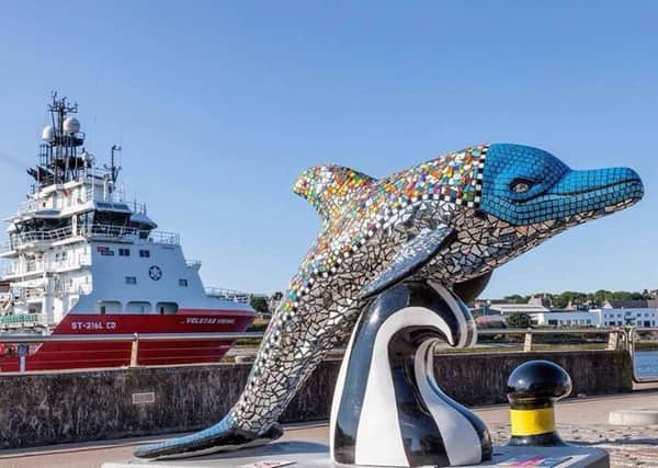 Rhona Duffy's dolphin mosaic in Aberdeen Harbour