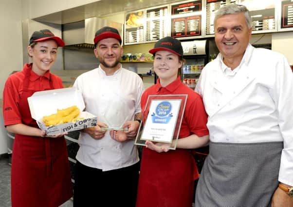 Flashback to last year when Camelon fish and chip shop Lemetti's won The Falkirk Herald Chippy of the Year trophy.  Pictured are  Cara Black, counter staff; Djlan Vettriano, licensee; Hannah Ironside, manager, and owner Gino Notarangelo.