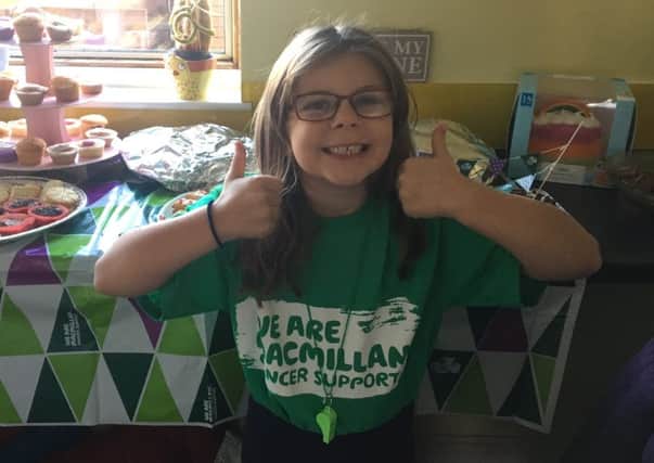 Beancross Primary School pupil Alyx Jack-Bryce raised Â£360 and counting by organising and hosting her own  Macmillan coffee morning at her family home in Grangemouth