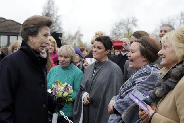 Princess Anne chats to people who waited to see her