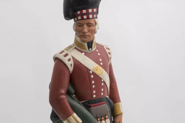 Figurine of an Argylls piper of the early 19th century.