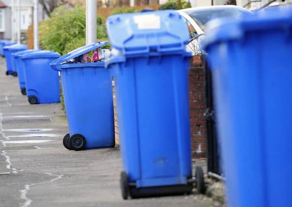 Recycling the contents of blue bins costs the council Â£500,000 a year