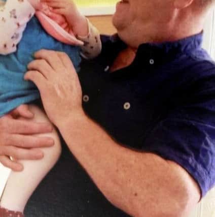 Chris Black with his beloved granddaughter Ava