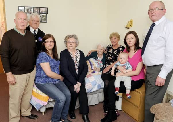 Bonnybridge care home resident Christina Wilson with family, protesters and councillors against the decision to close the 12 Bield care homes.