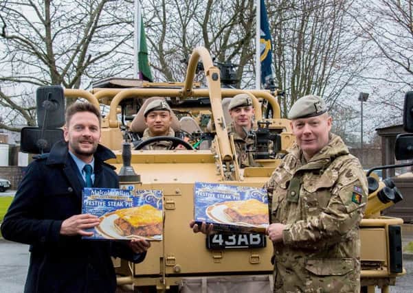 Malcolm Allan butchers gifting steak pies and lorne sausages to Royal Scots Dragoon Guards in Leuchars. They will be flown out to Cyprus to make a contribution to the Regiment's Christmas celebrations.