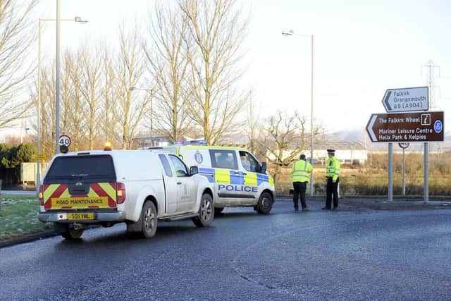 Officers closed the road at the Bog Roundabout.  Picture: Michael Gillen.