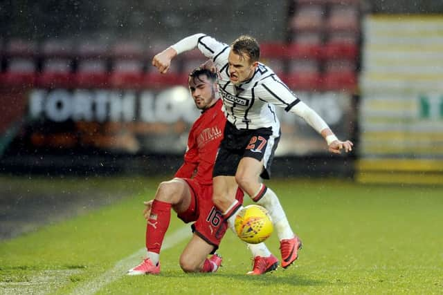 More than 7,000 including a packed away end watched the rivals clash. Picture Michael Gillen