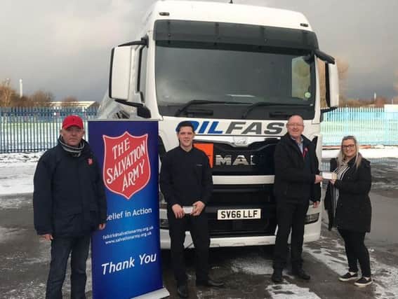 Pictured (l-r) Campbell Mcdermid, Salvation Army co-ordinator, Connor McCourt, of Oilfast, Ian French, Salvation Army manager, and Lisa Mitchell, of Oilfast.