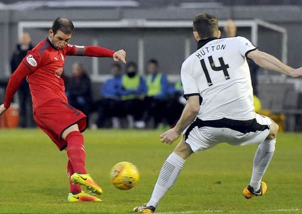 Mark Kerr in action during what was his last game for Falkirk, at Dumbarton last month.