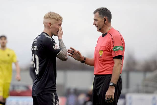 Craig Sibbald was struck in the face in the first half. Picture Michael Gillen.