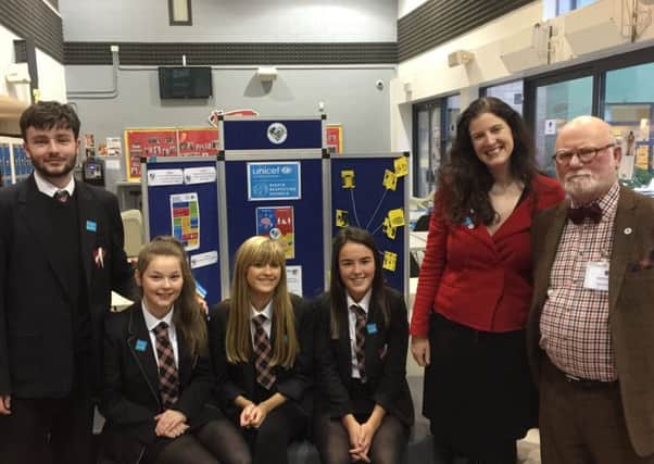 Braes High pupils (left to right) Luke Kerby,  Niamh Waddell, Kayleigh Graham and Megan Pullar who performed Holocaust memorial show pictured with head of humanities Fiona Malcolm and UN forensic investigator Robert McNeil
