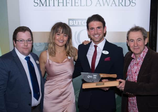 Thomas Johnston picks up the awards from BBC broadcaster Nigel Barden at the Smithfield event