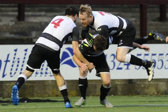 Andy Rodgers tries to catch matchwinner Connor Greene. Picture Alan Murray.
