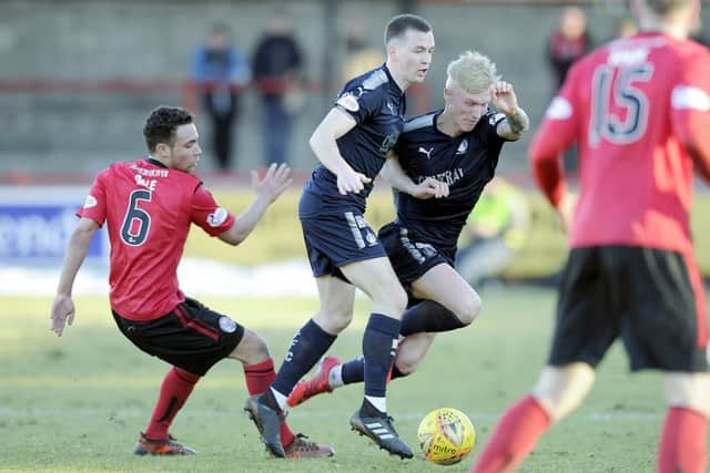 The sodden surface at Brechin's Glebe Park posed problems but the Bairns still won. Picture Michael Gillen.