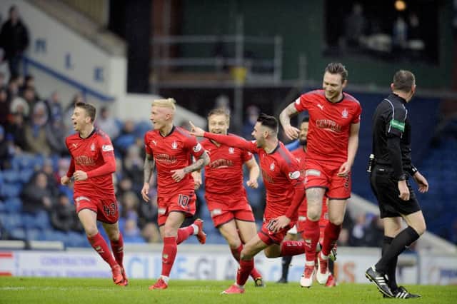 Falkirk celebrate Aaron Muirhead turning in Craig Sibbald's wayward effort for 1-1. Picture Michael Gillen.
