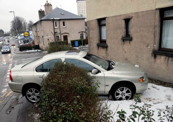 This car narrowly avoided crashing into a property on Kemper Avenue. Picture by Michael Gillen.