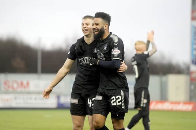 Two of Falkirk's goalscorers, Andy Nelson and Alex Jakubiak. Picture Michael Gillen.