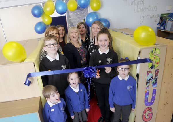 Launch of The SNUG at Wallacestone Primary School. Pupils at the front; Alec Buckley, Sophie Wardrope and Kara Peterson. Mid row; James Edwards and Olivia Park. Back; Anne Kerr, DHT; Louise Robertson; Evelyn Macdonald, HT; Michaela McMillan and Kelly Robertson, education psychologist Falkirk Council.