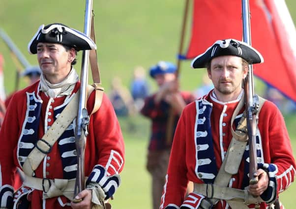 Redcoat soldiers at a previous Battle of Prestonpans re-enactment.  The annual event, near Edinburgh, has become an important tourism draw.