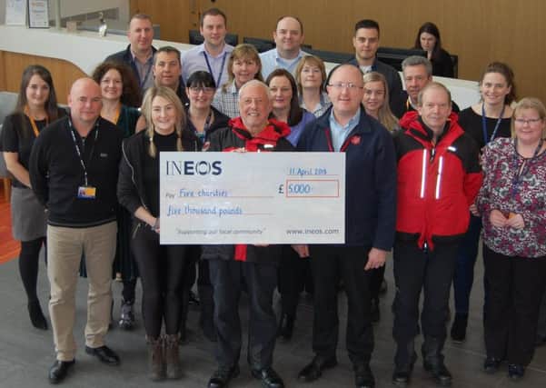 Employees at Ineos in Grangemouth have handed over a bumper sum of cash to five Scottish charities