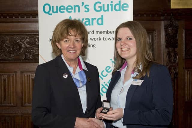 Queen's Guide Award...was presented to Rebecca MacLennan in 2016 by former Chief Guide Gill Slocombe. Rebecca is looking forward to taking part in Citizen Girl with her young charges.