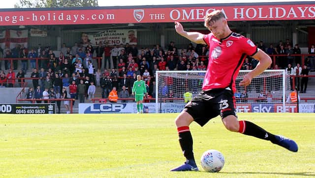 Patrick Brough on the ball for Morecambe