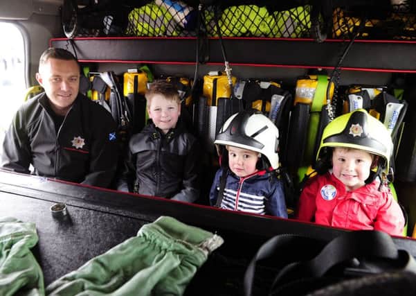 The Emergency Services Day at the Helix Park allows guests to see inside fire engines. Picture by Michael Gillen
